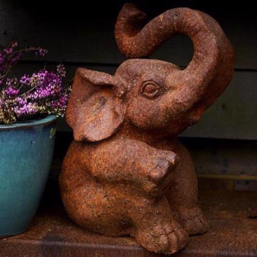 CAST IRON SITTING ELEPHANT STATUE